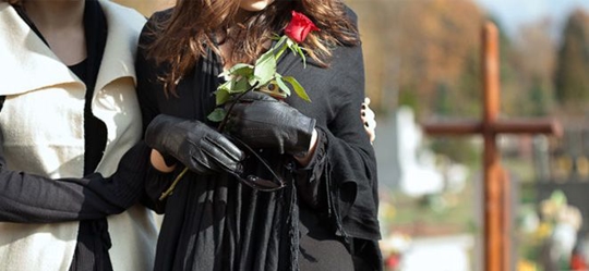 Woman at a funeral