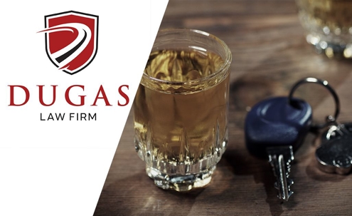 car keys on table next to alcoholic drink